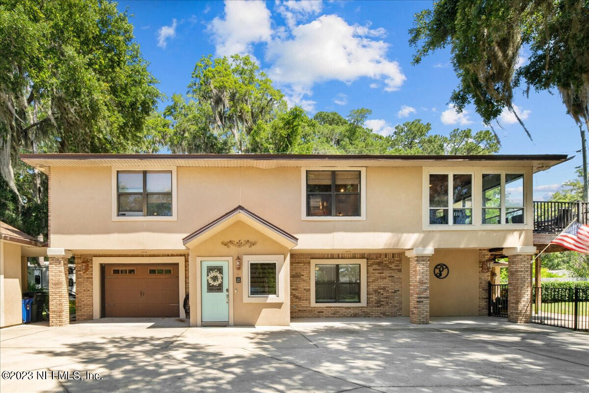174 Eventide Drive Fleming Island, FL 32003 - Photo 2 of 24 a view of a front door of a house
