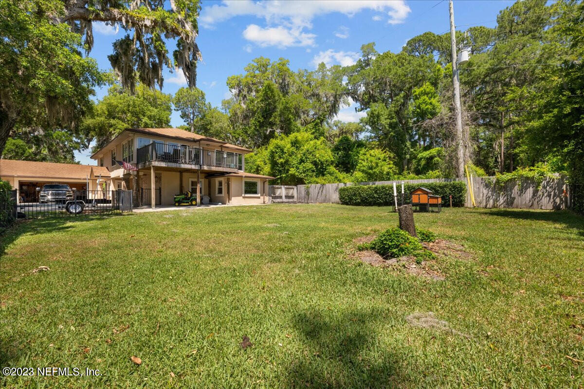 174 Eventide Drive Fleming Island, FL 32003 - Photo 24 of 24 a view of a house with a yard
