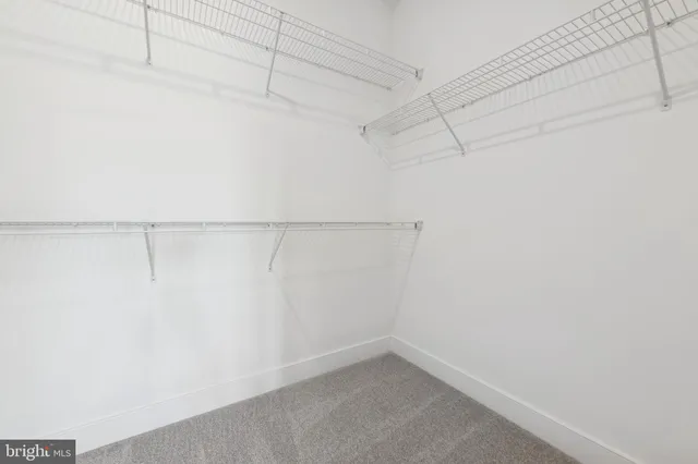 a view of a room with racks on the wall