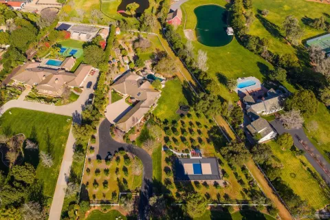 a backyard of a house with lots of green space