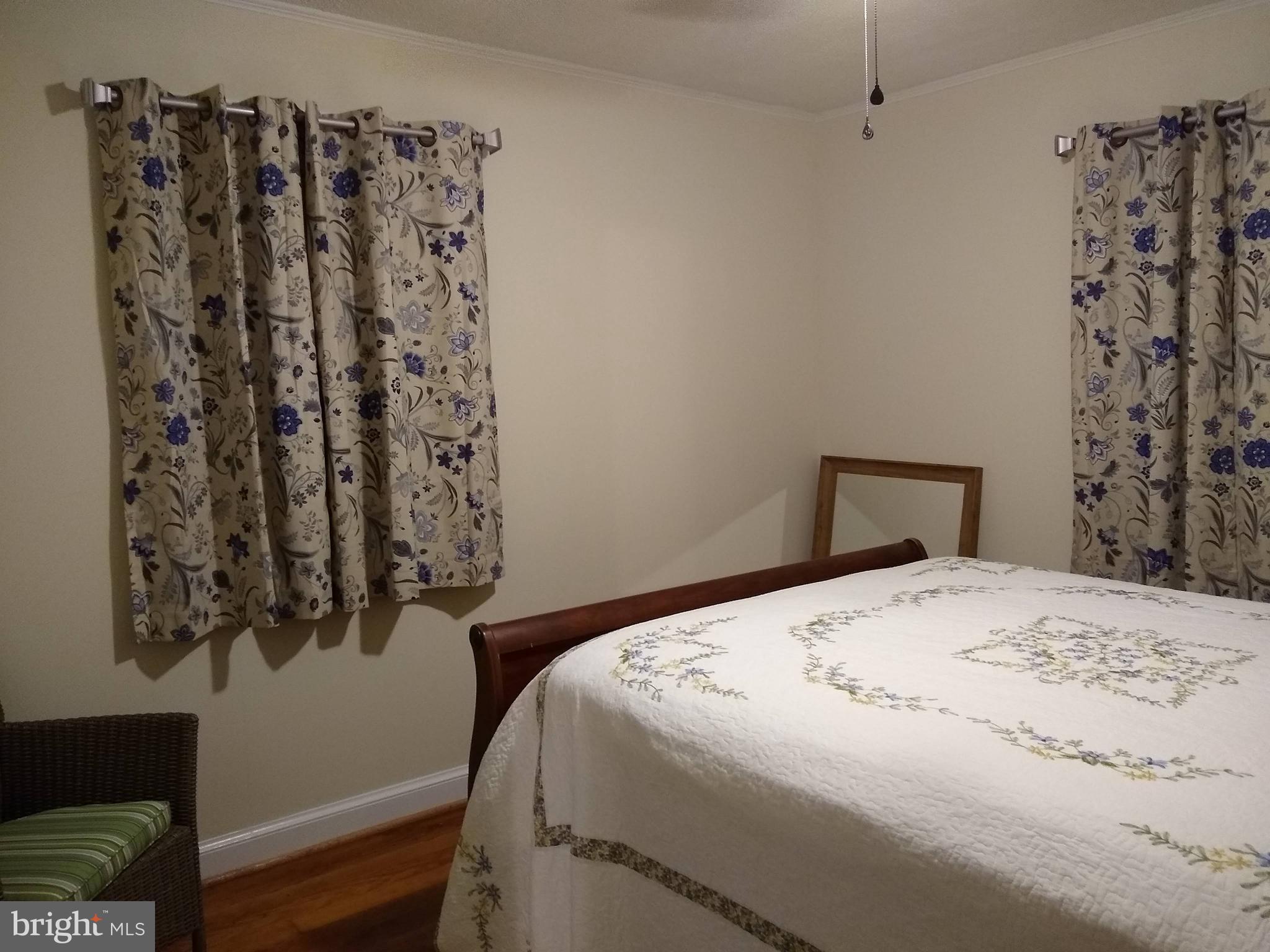10001 Grasty Gold Mine Road Rhoadesville, VA 22542 - Photo 12 of 30 Front bedroom accommodates queen bed