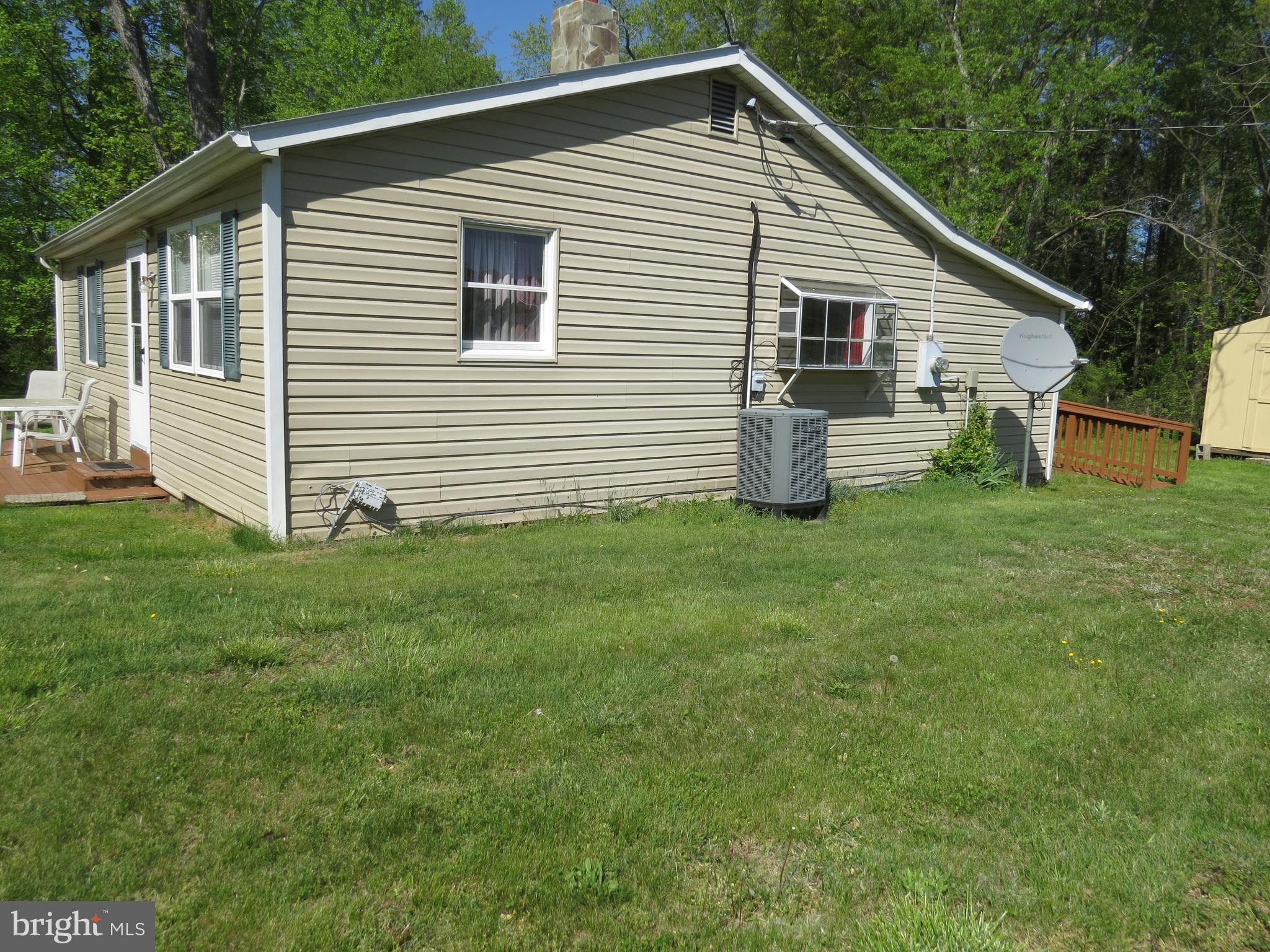 10001 Grasty Gold Mine Road Rhoadesville, VA 22542 - Photo 28 of 30 side view of house