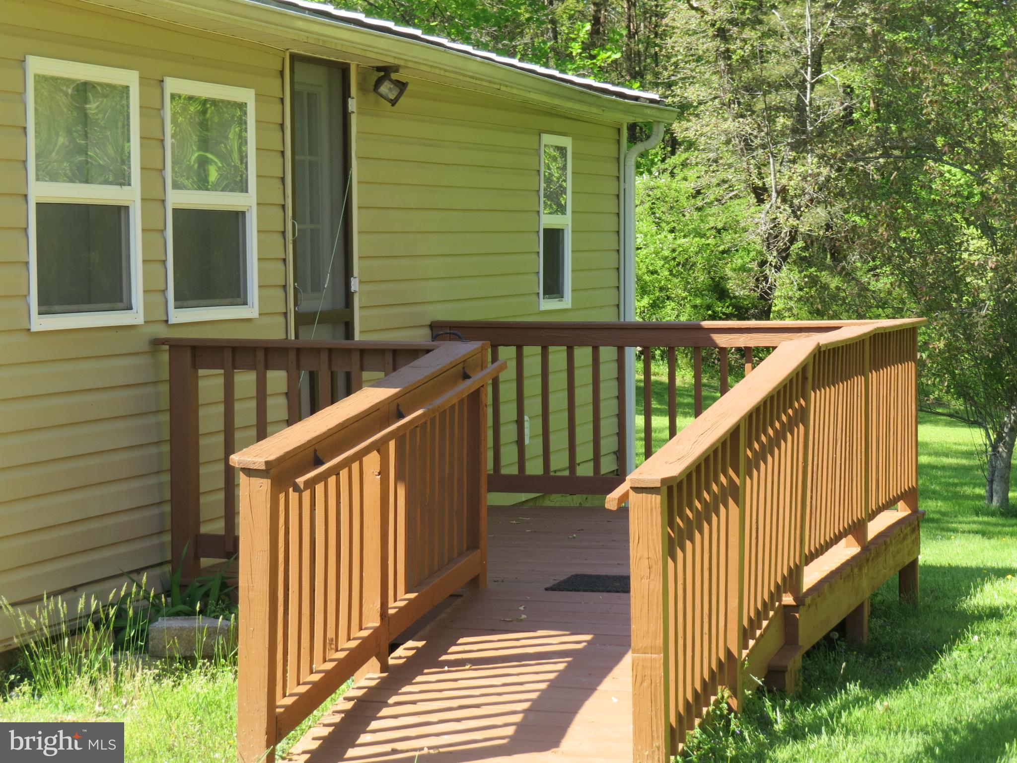 10001 Grasty Gold Mine Road Rhoadesville, VA 22542 - Photo 4 of 30 back deck with ramp