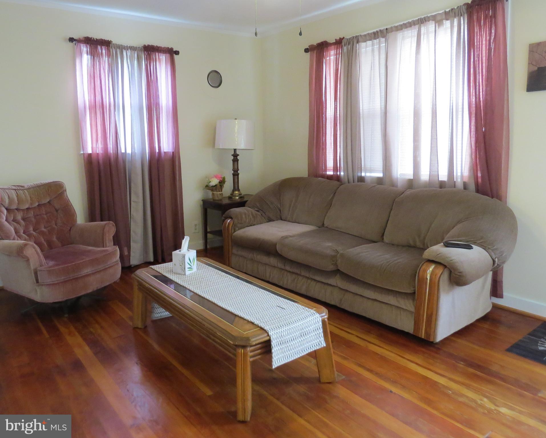 10001 Grasty Gold Mine Road Rhoadesville, VA 22542 - Photo 5 of 30 Living room with ceiling fan