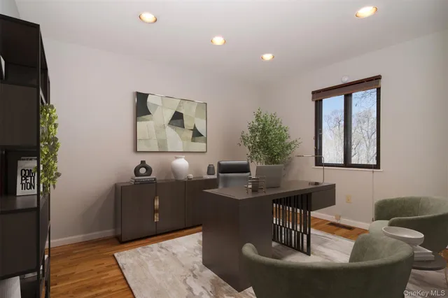 a spacious bedroom with a bed and a couch