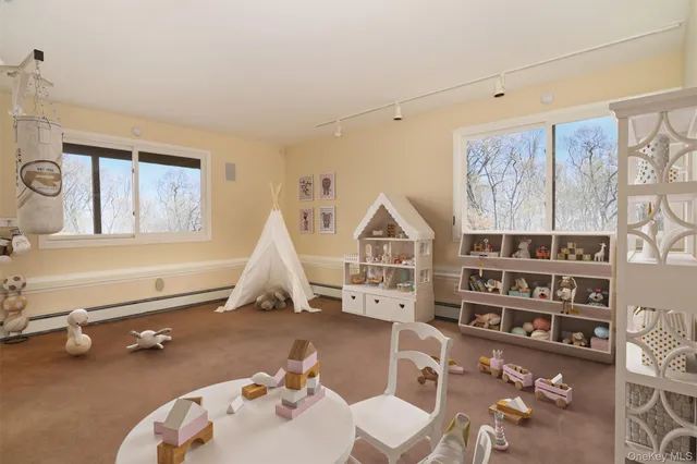 a view of a workspace with furniture