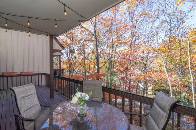 a backyard of a house with a tree