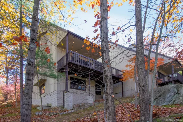 a view of tree in front of a house