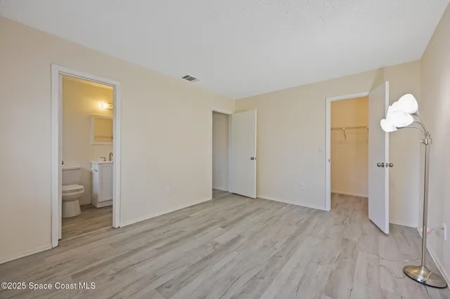 a bathroom with a toilet a sink and bathtub
