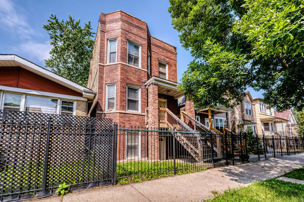 1738 North Harding Avenue Chicago, IL 60647 - Photo 1 of 21 front view of a house with a yard