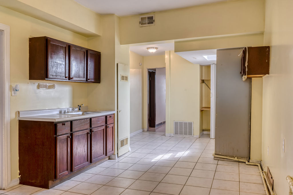 1738 North Harding Avenue Chicago, IL 60647 - Photo 19 of 21 a bathroom with a sink and a mirror