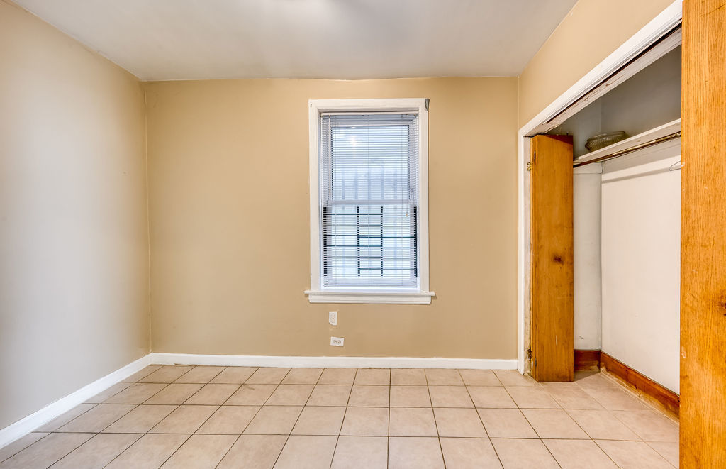 1738 North Harding Avenue Chicago, IL 60647 - Photo 8 of 21 a view of an empty room with window