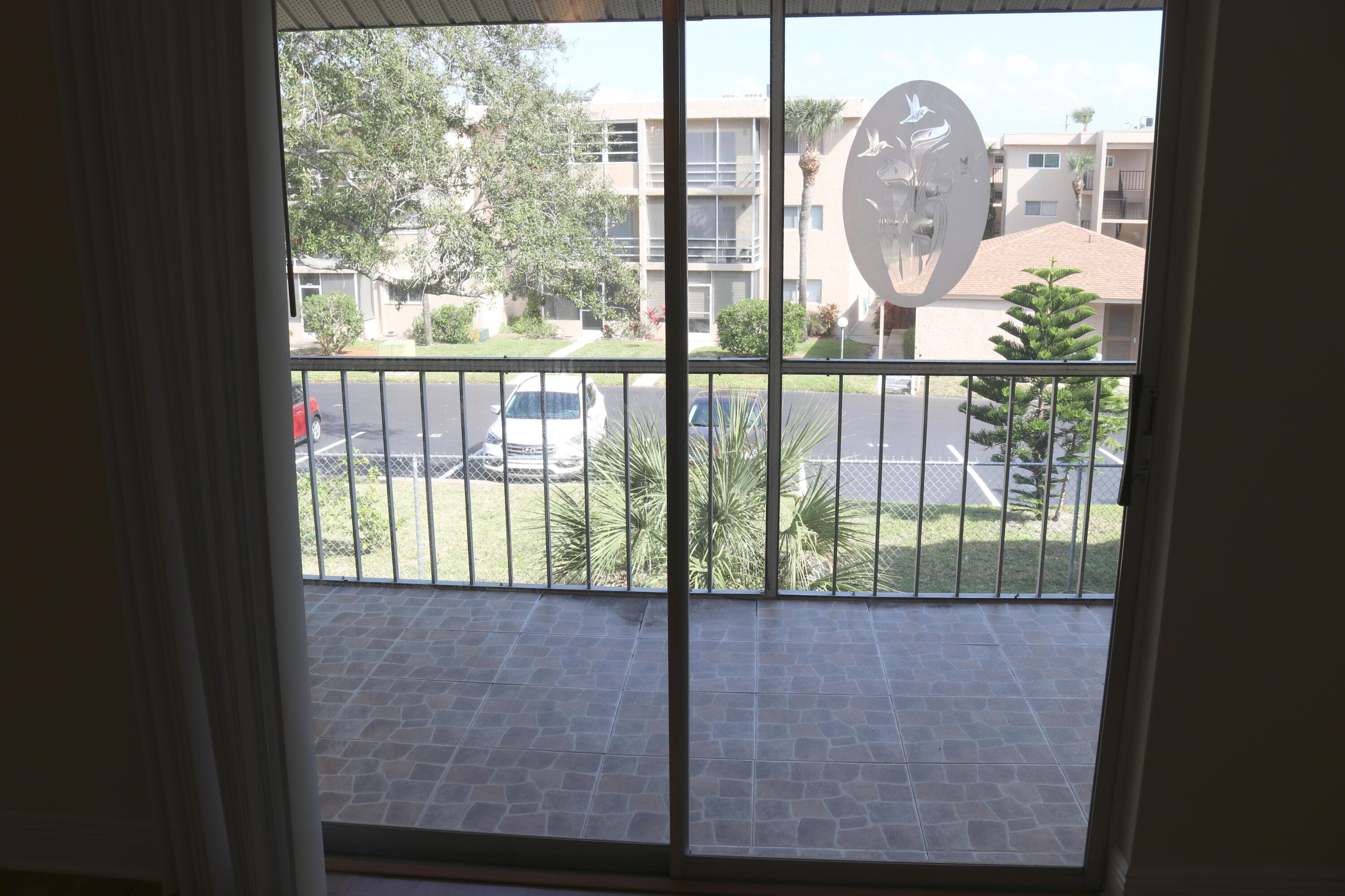 3135 Shady Dell Lane, Unit 242 Melbourne, FL 32935 - Photo 13 of 15 Screened Patio