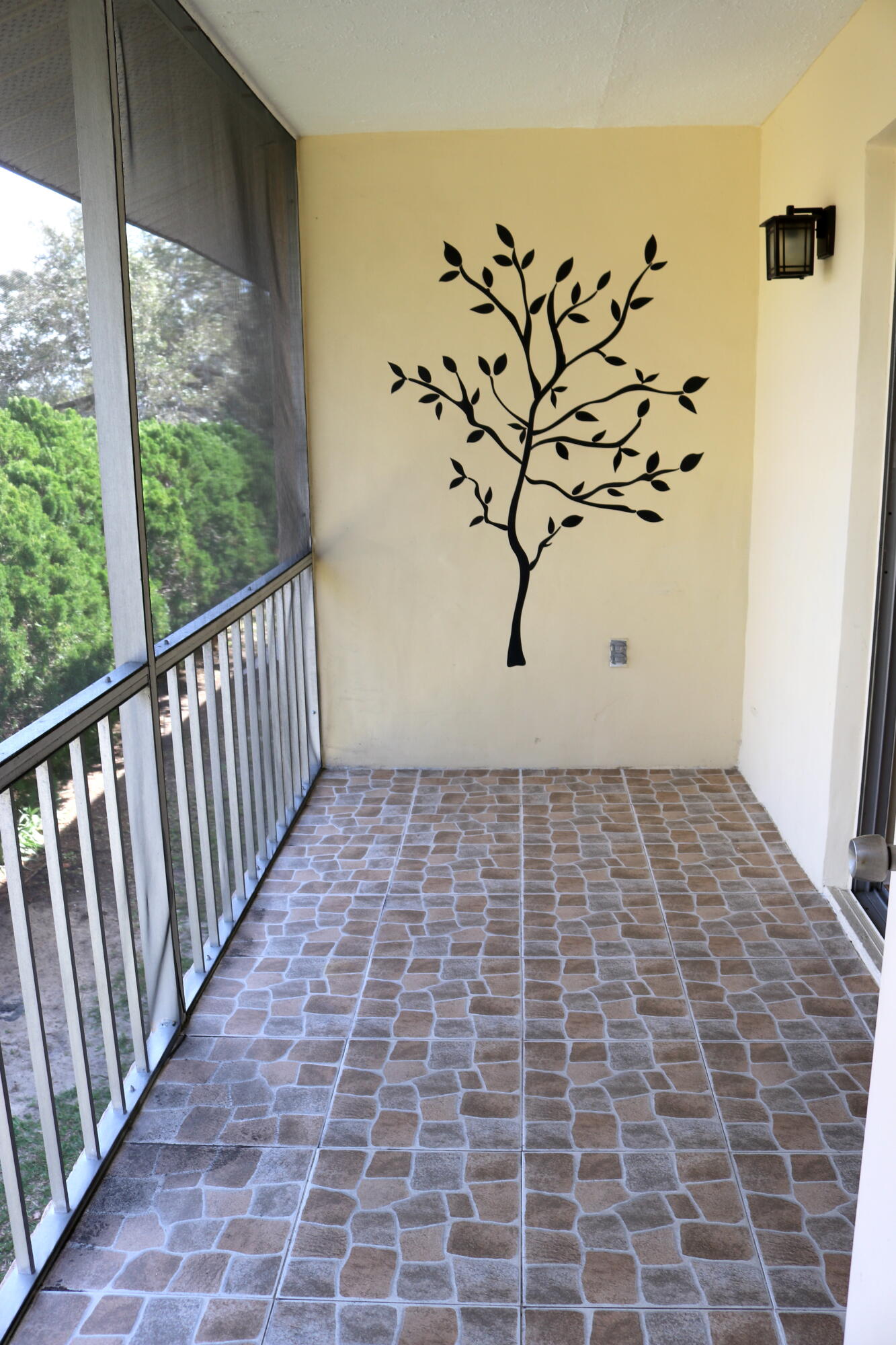 3135 Shady Dell Lane, Unit 242 Melbourne, FL 32935 - Photo 14 of 15 Screened Patio