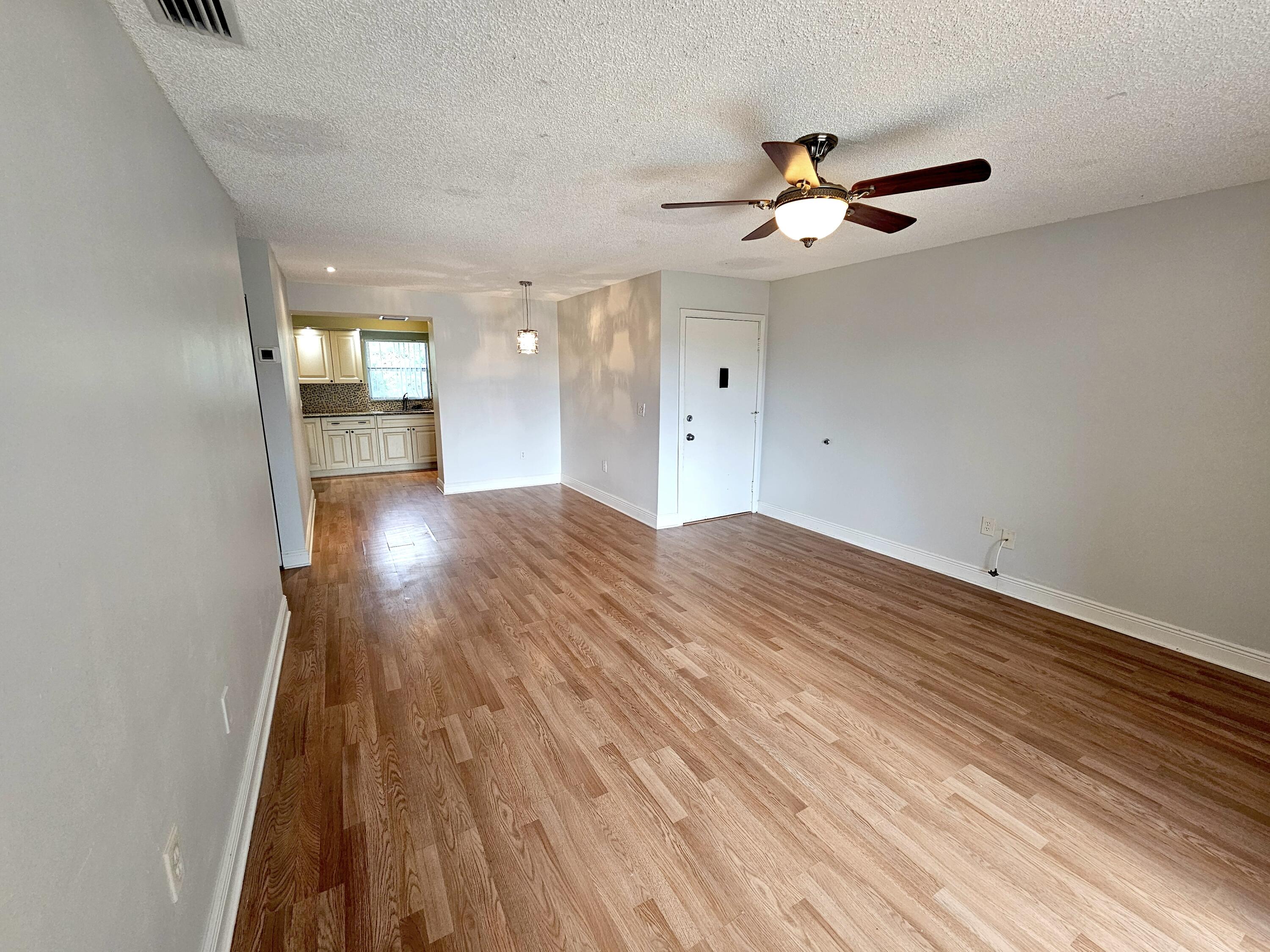 3135 Shady Dell Lane, Unit 242 Melbourne, FL 32935 - Photo 2 of 15 Living-Dining