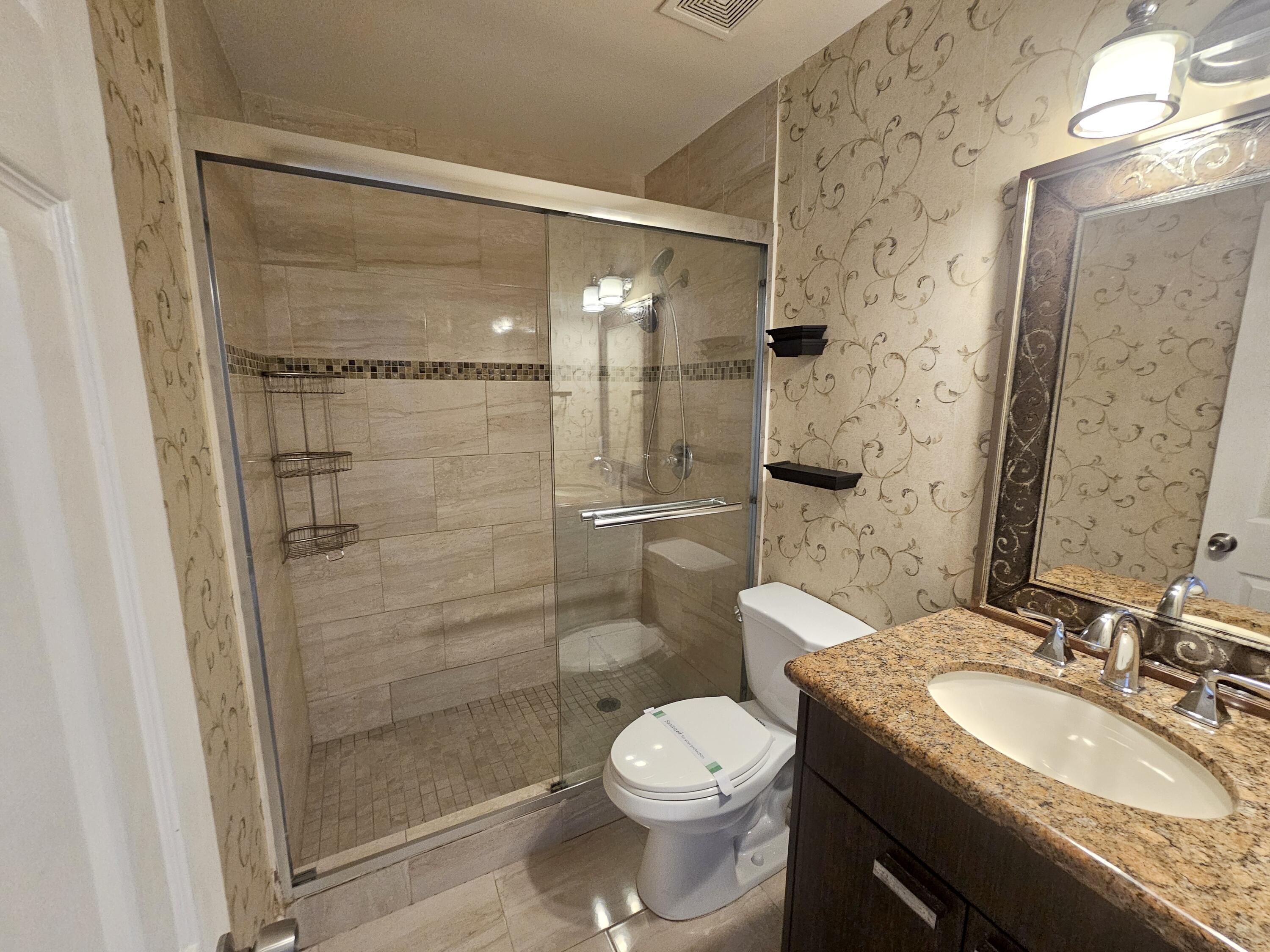 3135 Shady Dell Lane, Unit 242 Melbourne, FL 32935 - Photo 10 of 15 Primary Bathroom