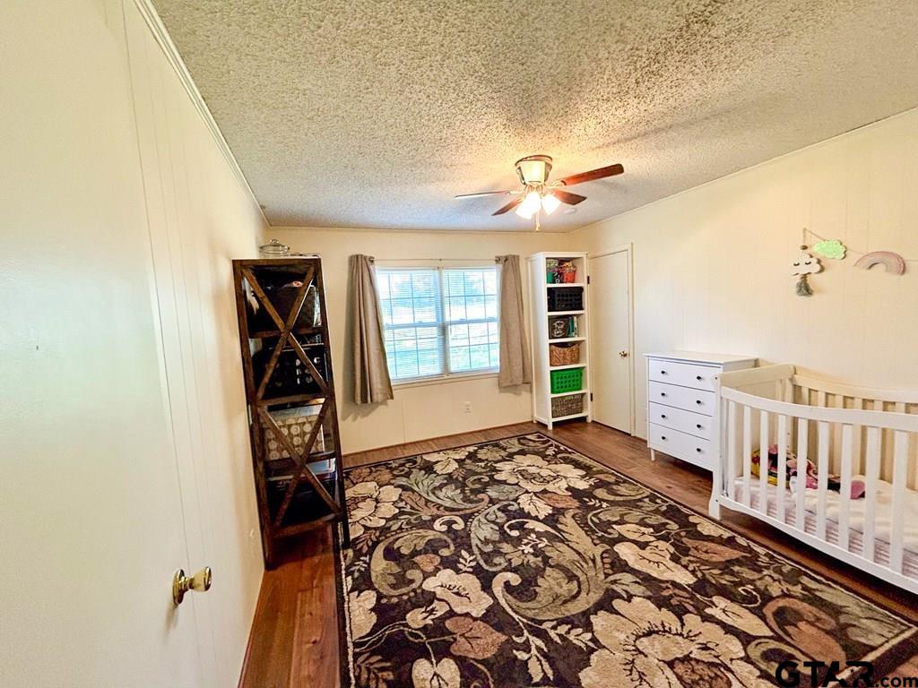 213 Sherry Lane Palestine, TX 75803 - Photo 19 of 25 a bedroom with furniture and a window