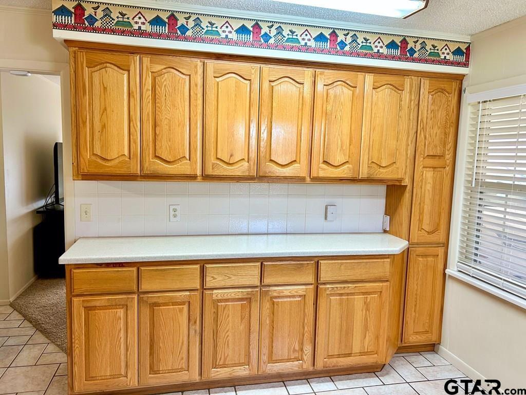 213 Sherry Lane Palestine, TX 75803 - Photo 8 of 25 a close view of wooden cabinets