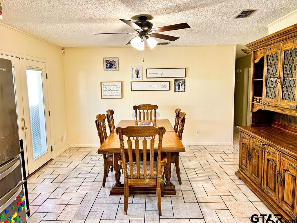 213 Sherry Lane Palestine, TX 75803 - Photo 10 of 25 a view of a dining room with furniture