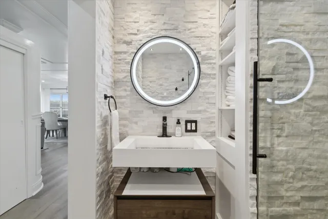 a bathroom with a sink and a mirror