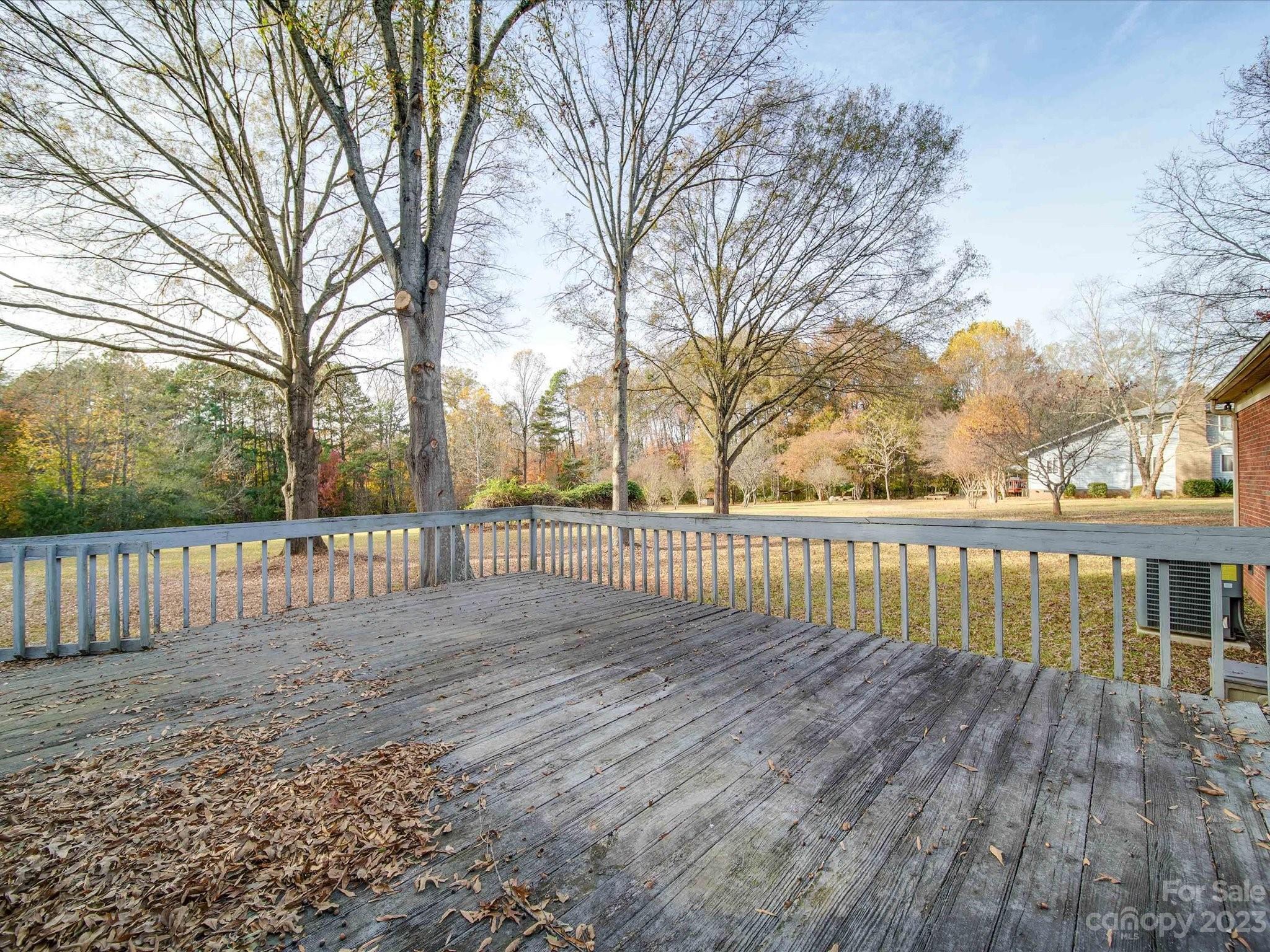 3237 Horseshoe Trail Fort Mill, SC 29708 - Photo 4 of 33 a view of a wooden deck with trees