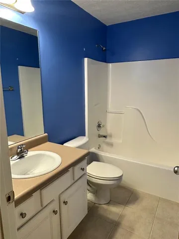 a bathroom with a toilet