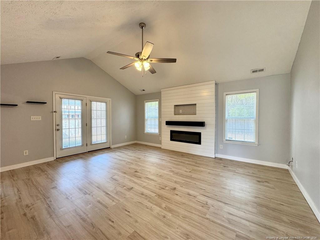 5503 Rising Ridge Drive Hope Mills, NC 28348 - Photo 8 of 18 a view of empty room with wooden floor and fan