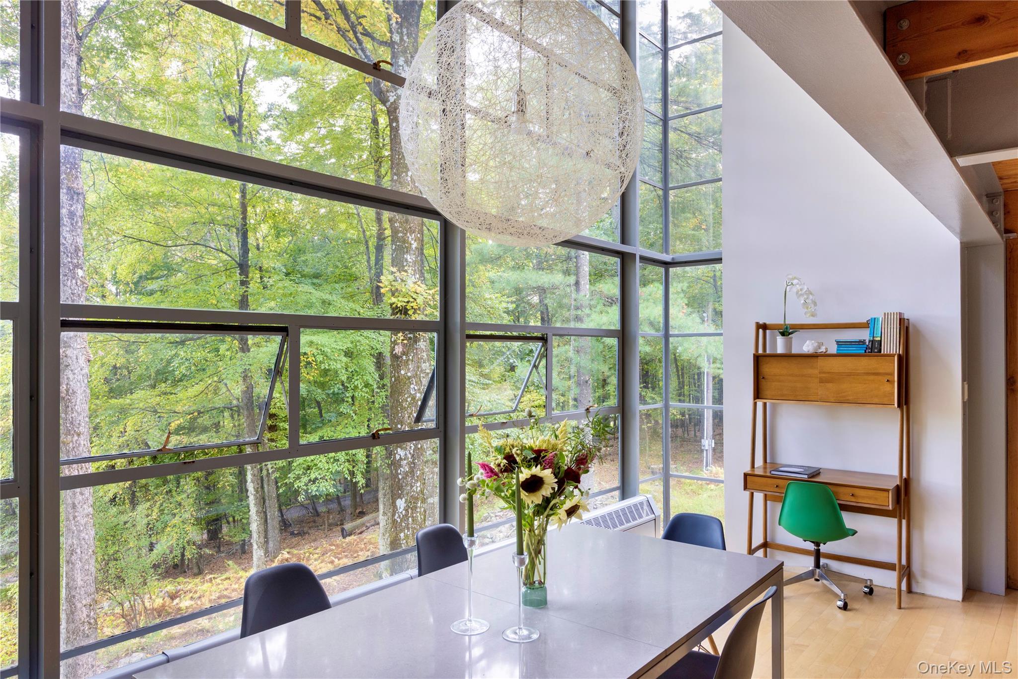 39 Hornbeck Road Accord, NY 12404 - Photo 7 of 24 a view of a dining room with furniture window and wooden floor