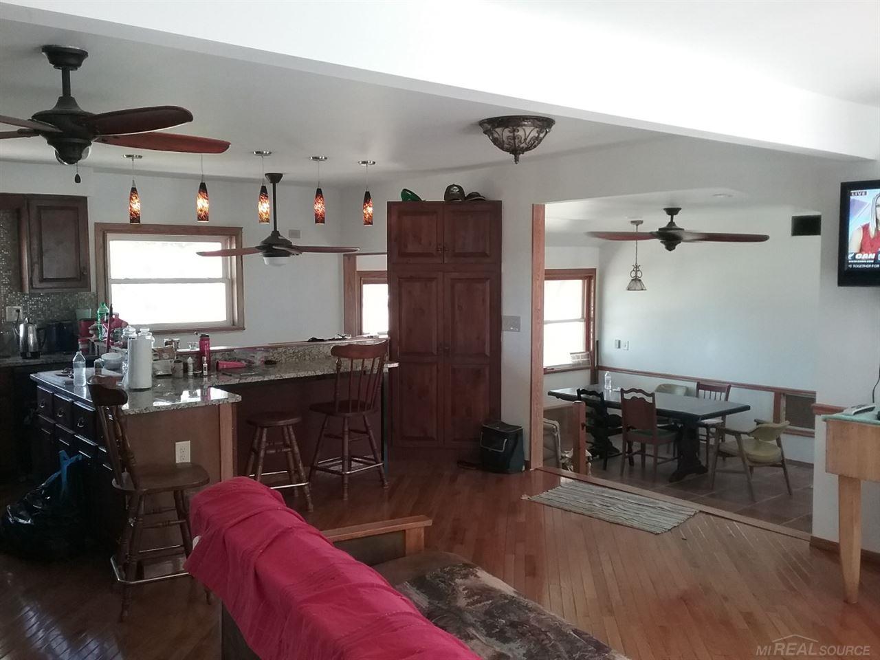 5162 Montgomery Road Marlette, MI 48453 - Photo 6 of 22 This is looking into the dinning room from the Kitchen area