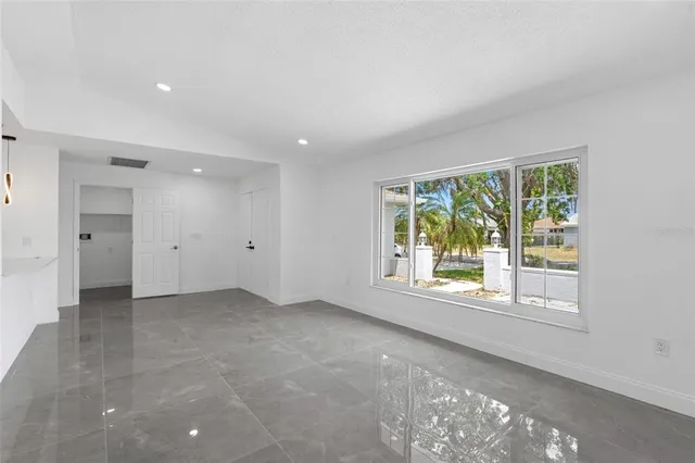 a bathroom with a sink a vanity and a mirror