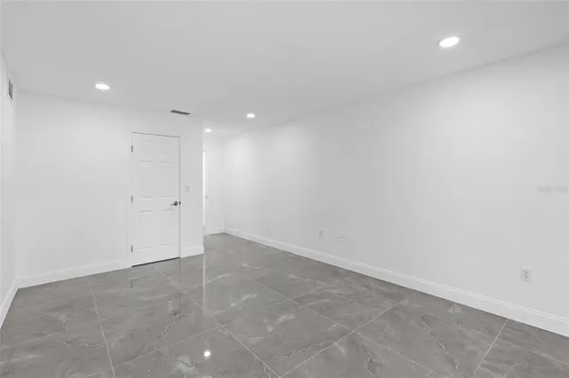 a view of a livingroom with furniture