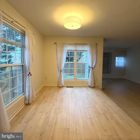 a view of a kitchen with a sink and a stove