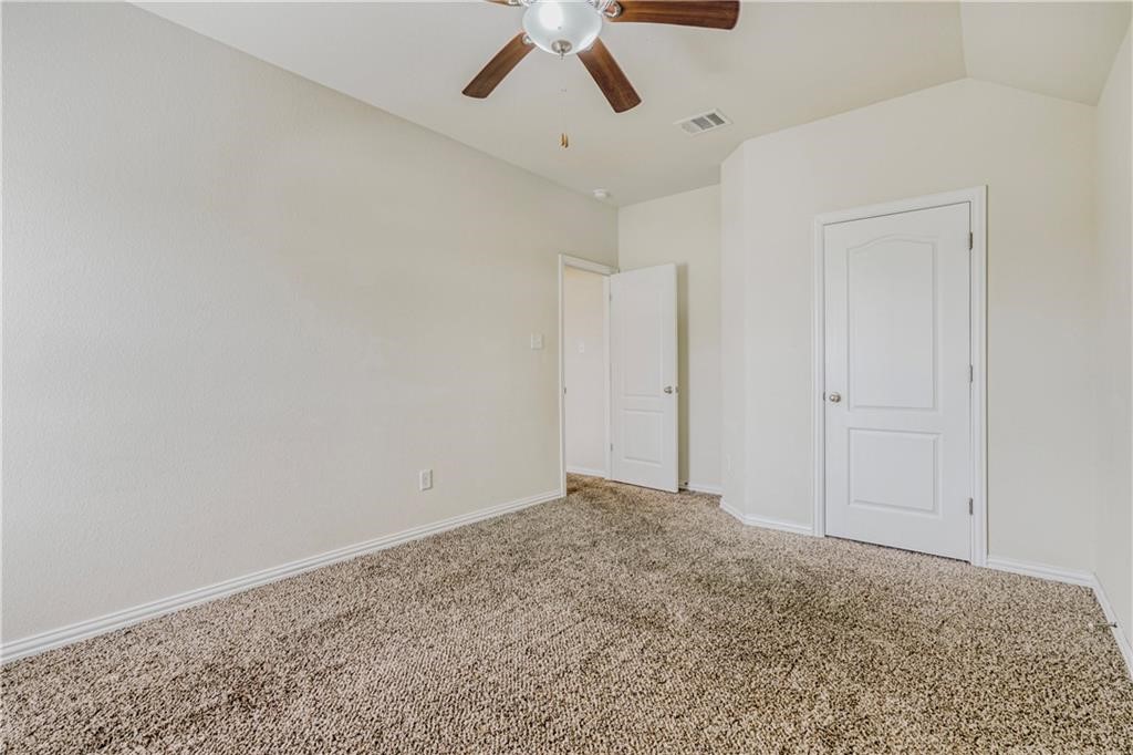 3517 Grail Hollows Road Pflugerville, TX 78660 - Photo 13 of 40 a view of an empty room