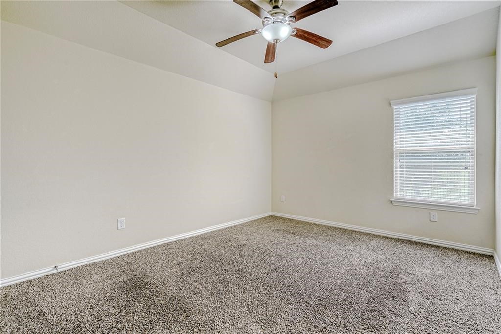 3517 Grail Hollows Road Pflugerville, TX 78660 - Photo 14 of 40 an empty room with fan and windows
