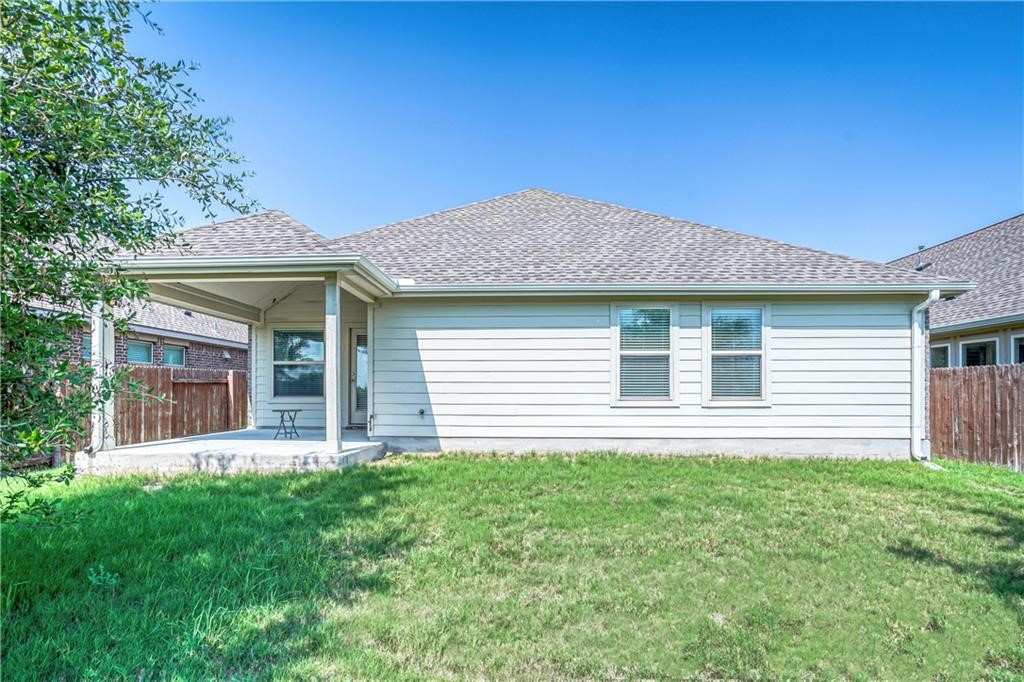 3517 Grail Hollows Road Pflugerville, TX 78660 - Photo 9 of 40 a house view with a garden space