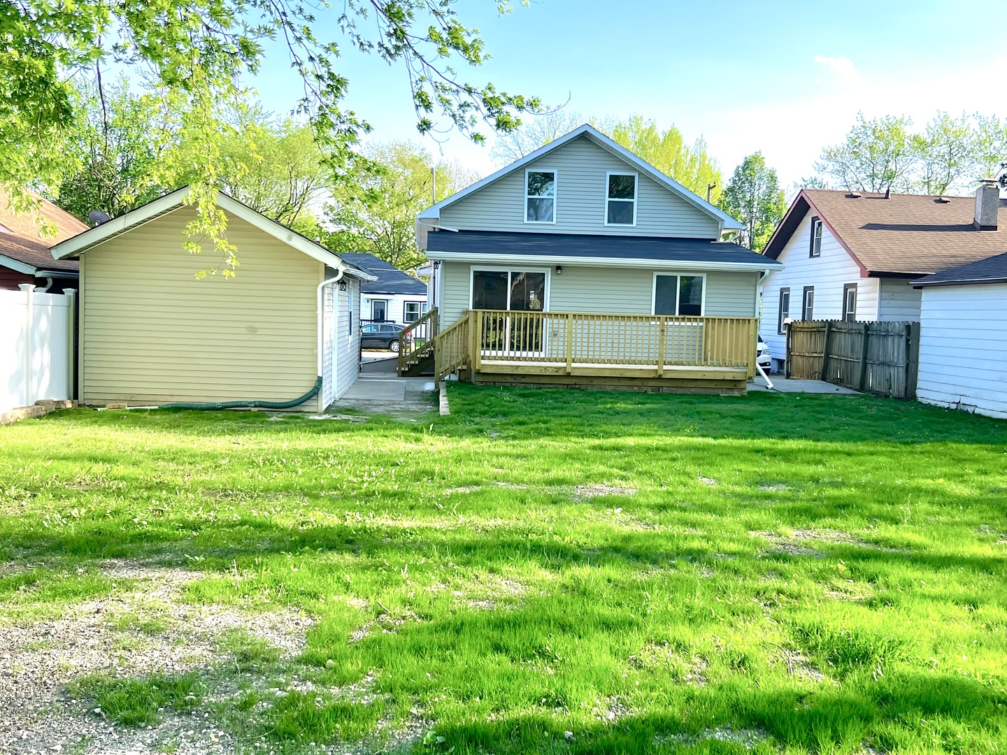 126 Prairie Street Ottawa, IL 61350 - Photo 15 of 15 a front view of a house with a yard and garage