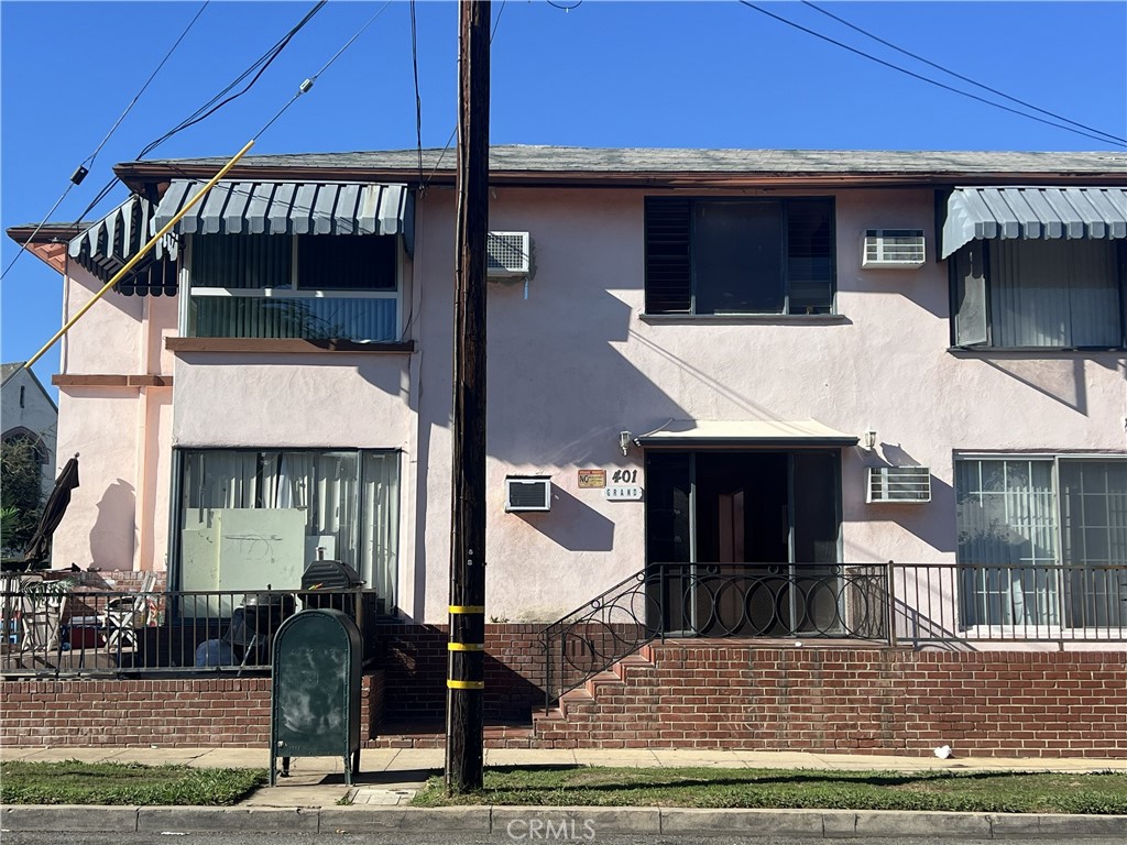 401 West Grand Avenue, Unit C Alhambra, CA 91801 - Photo 1 of 14 a view of entryway with a yard
