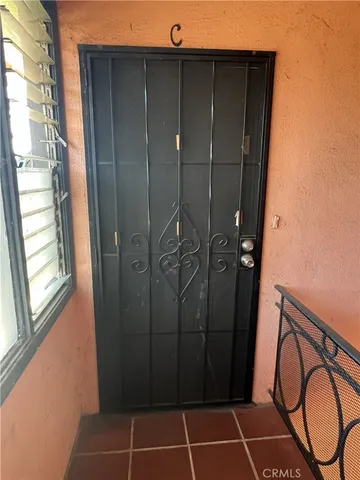 a bathroom with a shower and a mirror