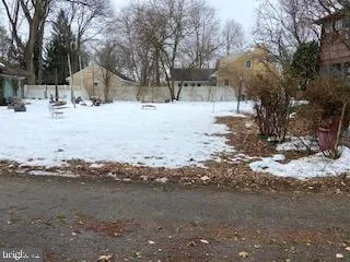a view of a yard with an outdoor space
