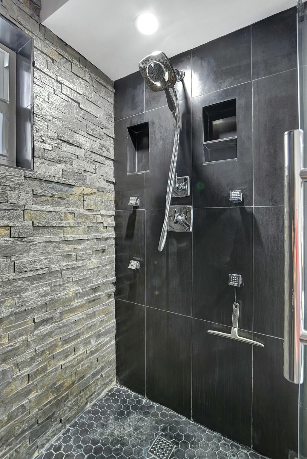 2871 North Ocean Boulevard, Unit V441 Boca Raton, FL 33431 - Photo 19 of 75 a bathroom with a shower