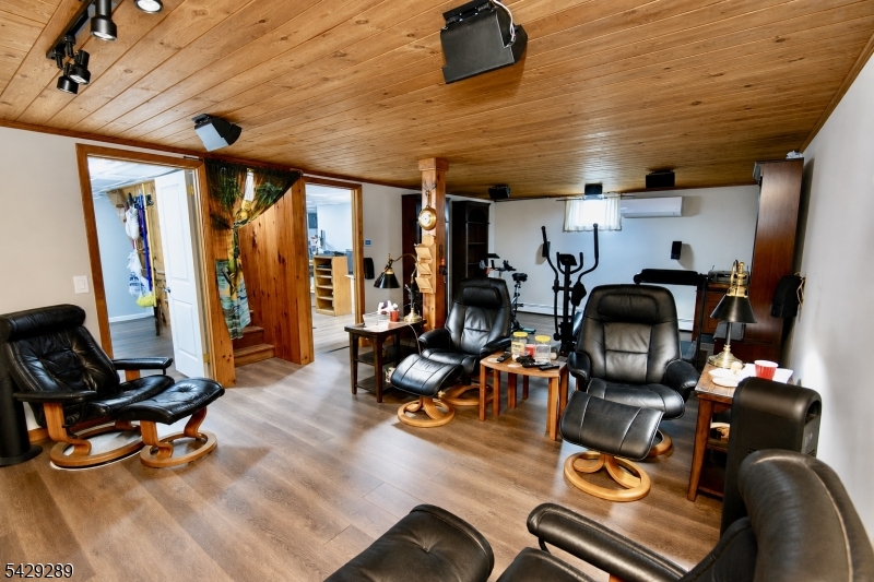 16 Pequot Trail Oak Ridge, NJ 07438 - Photo 13 of 18 a view of a room with gym equipment