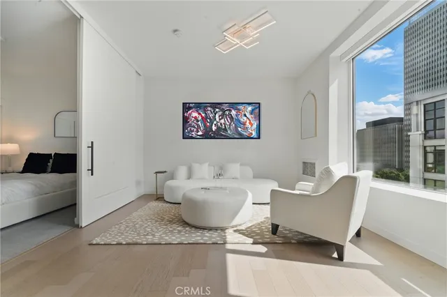 a living room with furniture and window