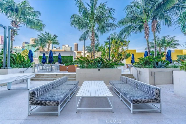 a view of a patio with a patio and a swimming pool