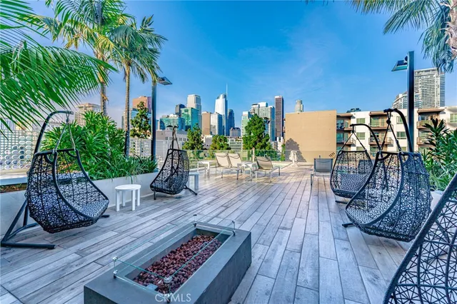 a view of a backyard with swimming pool