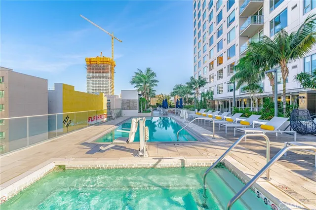 a view of a swimming pool with a patio