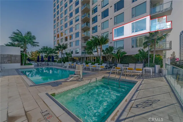 a view of a swimming pool with a patio