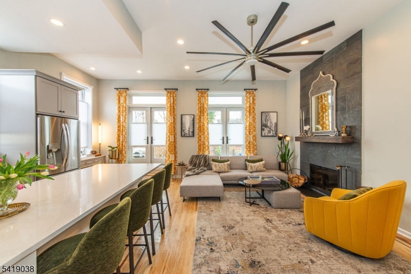 523 Trinity Place Westfield, NJ 07090 - Photo 13 of 33 a living room with furniture fireplace and flat screen tv