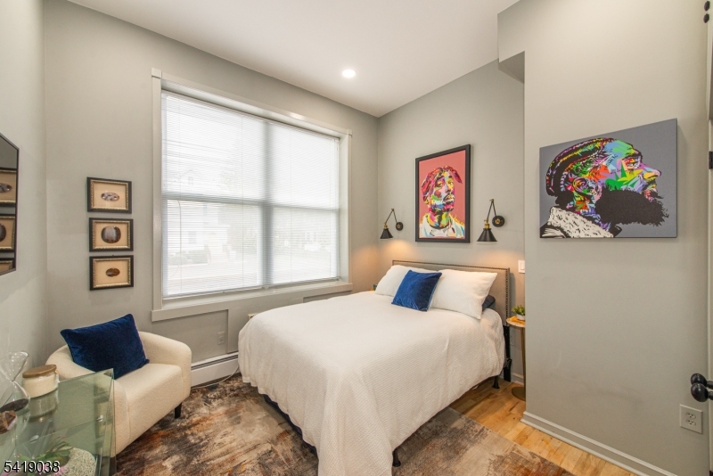 523 Trinity Place Westfield, NJ 07090 - Photo 24 of 33 a bedroom with a bed and a window