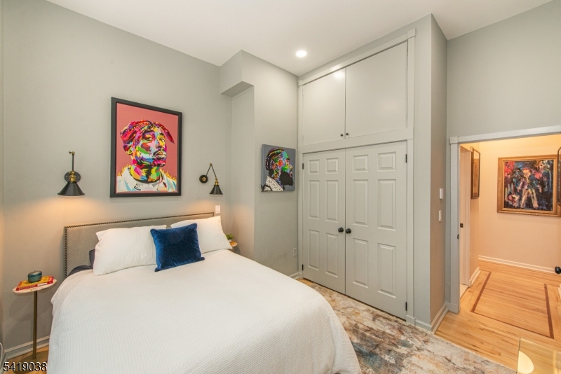 523 Trinity Place Westfield, NJ 07090 - Photo 25 of 33 a bedroom with a large bed and a shower