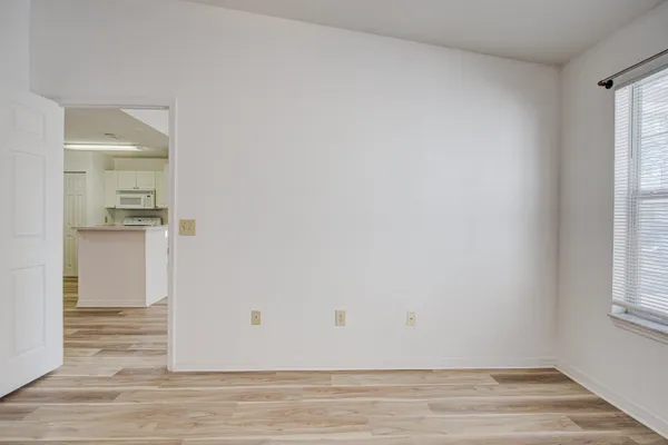 a view of livingroom with hardwood floor and window